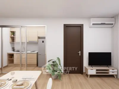 Modern apartment interior with kitchen and living area, featuring sleek furniture and wooden flooring.