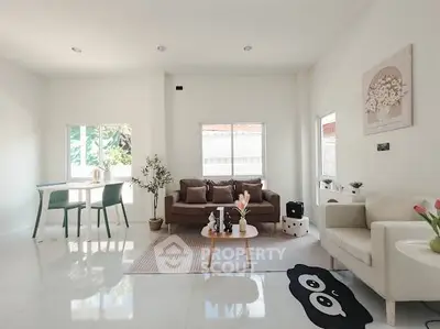 Bright and airy living room with modern decor and natural light