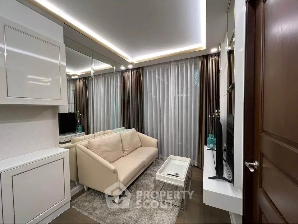 Modern living room with sleek design, featuring a cozy sofa, stylish lighting, and floor-to-ceiling windows.