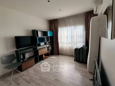 Modern living room with stylish shelving and natural light