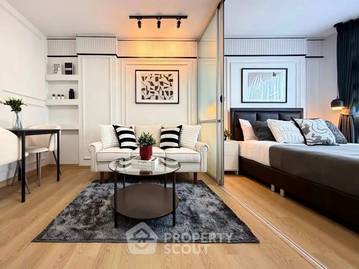 Modern studio apartment with stylish decor and cozy living area