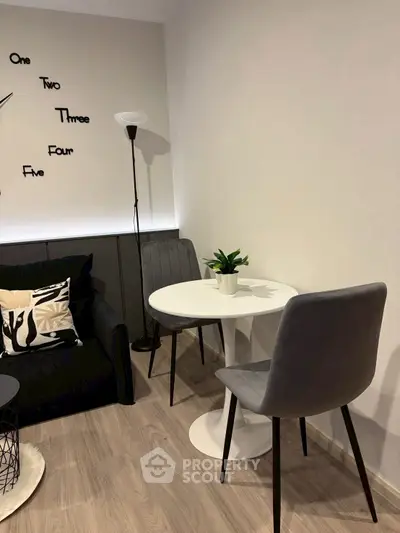 Modern living room with stylish decor and cozy seating area