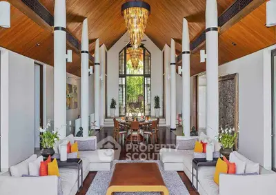 Luxurious open-plan living room with high ceilings and elegant decor
