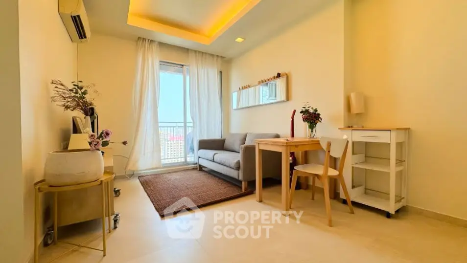 Bright living room with modern furniture and balcony view