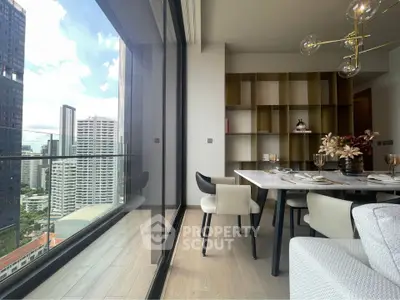 Luxurious dining area with stunning city view and elegant decor in modern apartment.