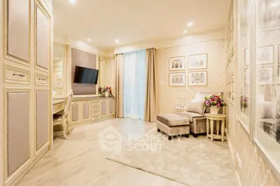 Luxurious living room with elegant decor and plush seating in a sophisticated apartment.