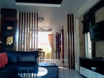 Modern living room with sleek furniture and open layout design