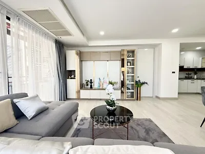 Spacious modern living room with elegant decor and natural light