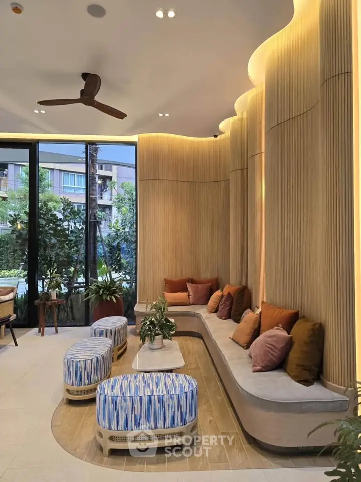 Luxurious modern living room with stylish seating and elegant lighting