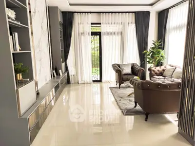 Luxurious living room with elegant furniture and floor-to-ceiling windows, offering a bright and inviting atmosphere.
