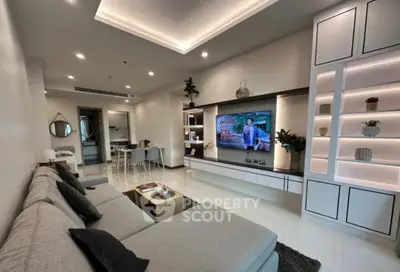 Modern living room with sleek design, spacious layout, and stylish built-in shelving.