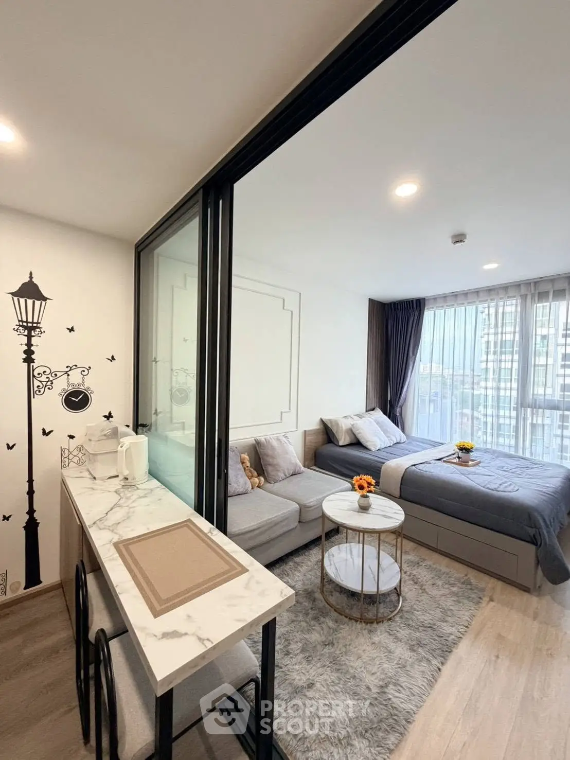 Modern studio apartment with stylish decor and cozy living area