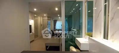 Modern open-plan living room with stylish decor and ample natural light