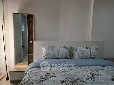Cozy bedroom with floral bedding and modern decor