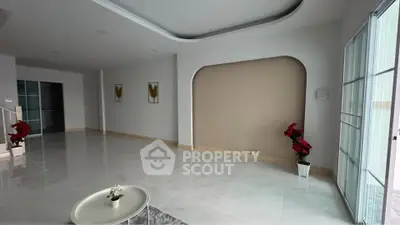 Spacious modern living room with elegant decor and natural light