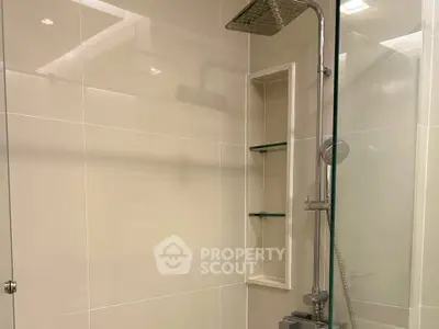 Modern bathroom with sleek shower and glass enclosure