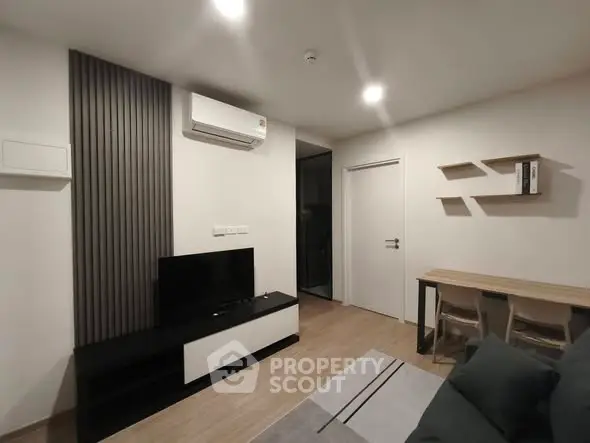 Modern living room with sleek furniture and minimalist design