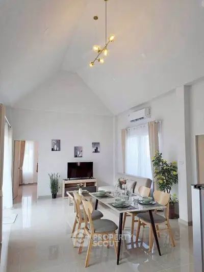 Spacious modern living room with dining area and stylish decor