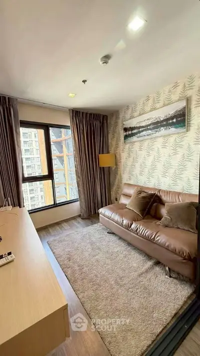 Stylish living room with modern decor and city view, featuring a cozy leather sofa and elegant curtains.
