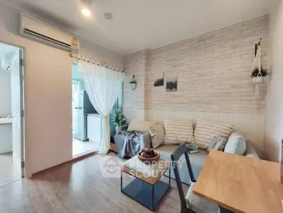 Charming living room with cozy seating and modern decor, perfect for relaxation and entertaining.