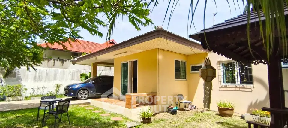 Charming single-story home with carport and lush garden in tranquil neighborhood.
