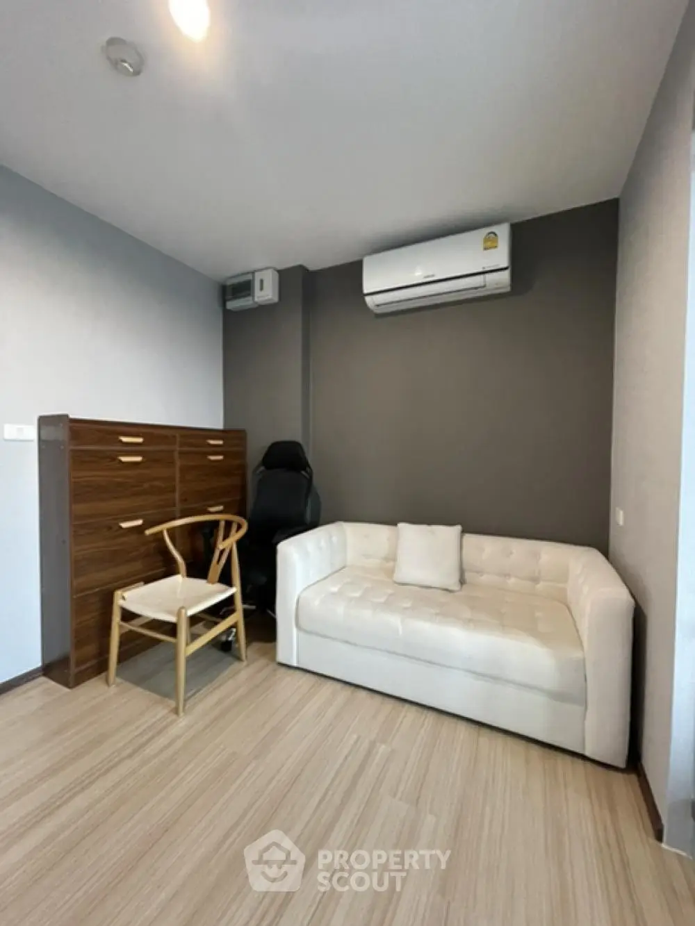 Modern study room with sleek furniture and air conditioning