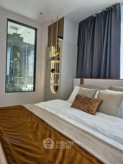 Luxurious bedroom with elegant decor and modern ensuite bathroom view