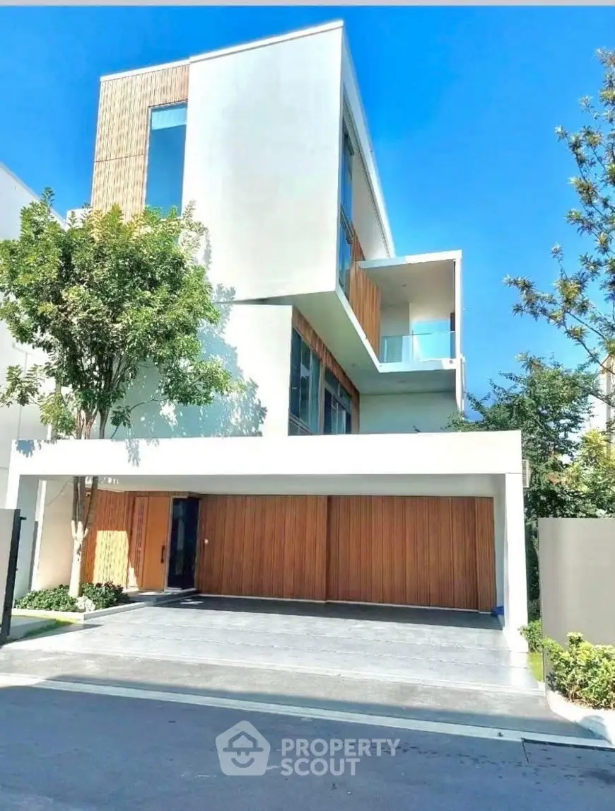 Modern luxury home with sleek design and spacious garage