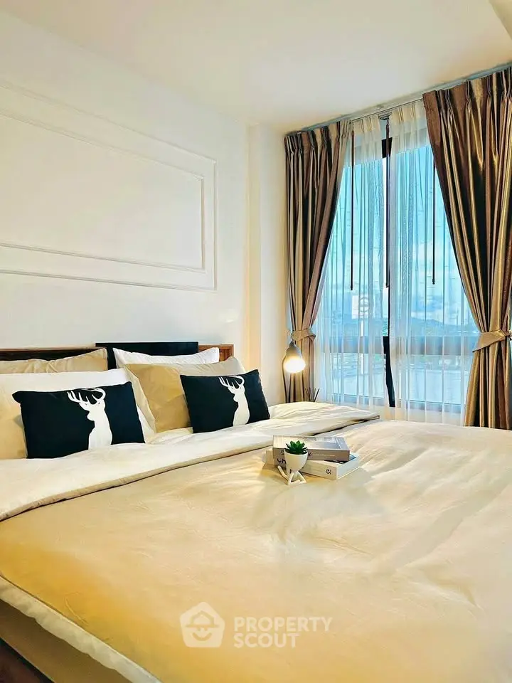 Luxurious bedroom with elegant decor and stunning city view