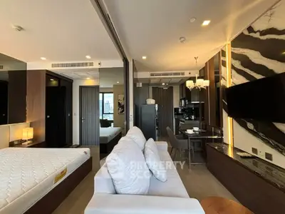 Luxurious modern studio apartment with open layout, stylish decor, and ample natural light.