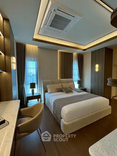 Luxurious modern bedroom with elegant lighting and stylish decor