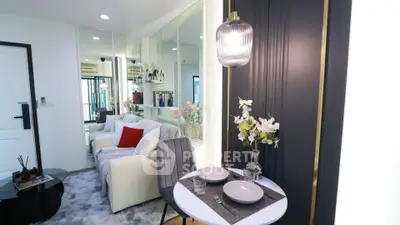 Modern living room with stylish decor and dining area in a cozy apartment