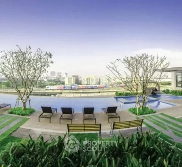 Luxurious rooftop pool with stunning city views and modern lounge chairs.