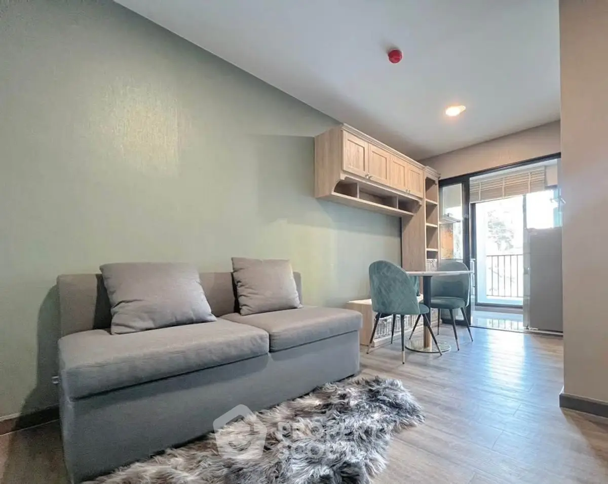 Modern living room with cozy sofa and stylish decor in bright apartment