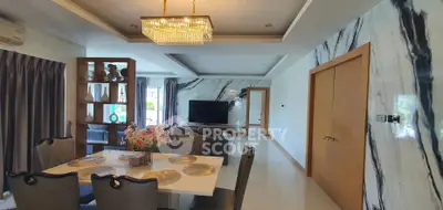 Luxurious living room with elegant dining area and modern decor