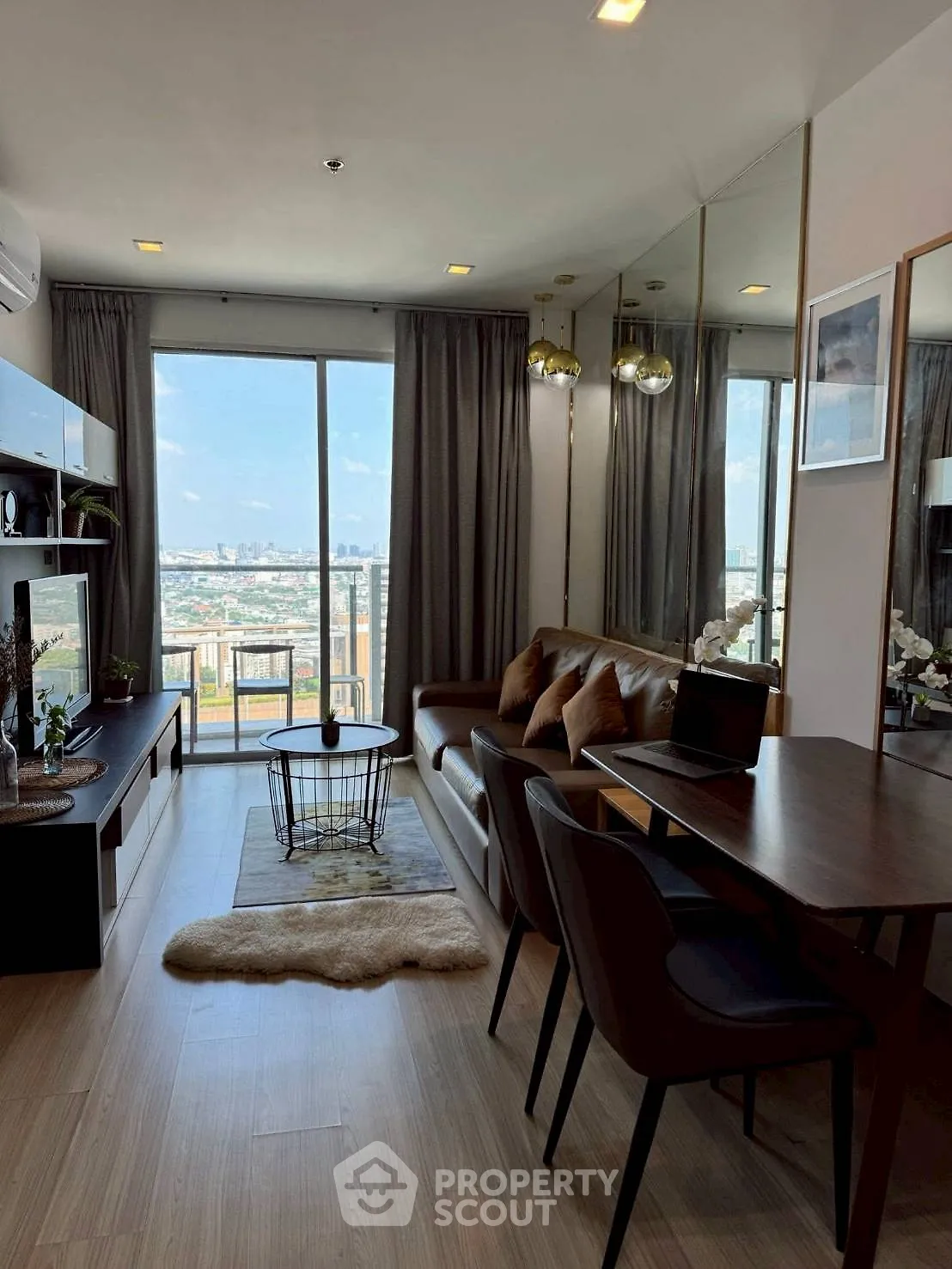 Stylish modern living room with city view and elegant decor