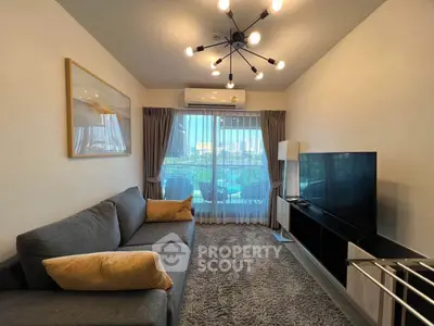 Modern living room with stylish lighting and balcony view