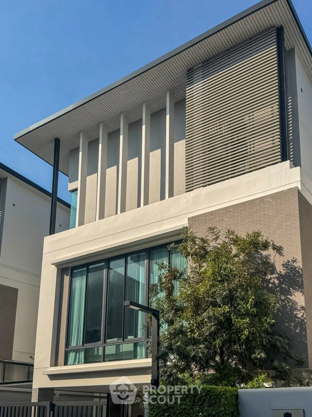 Modern architectural home exterior with sleek lines and large windows