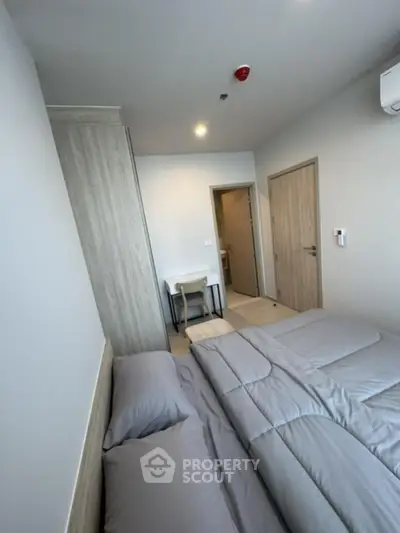 Modern bedroom with minimalist design and neutral tones