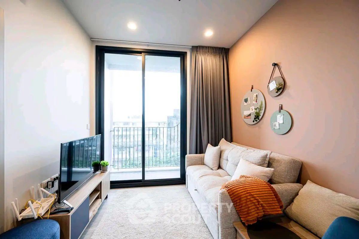 Cozy living room with modern decor and balcony view