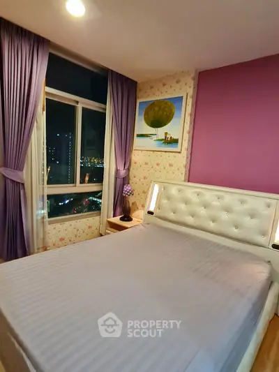 Cozy bedroom with city view, purple curtains, and stylish decor