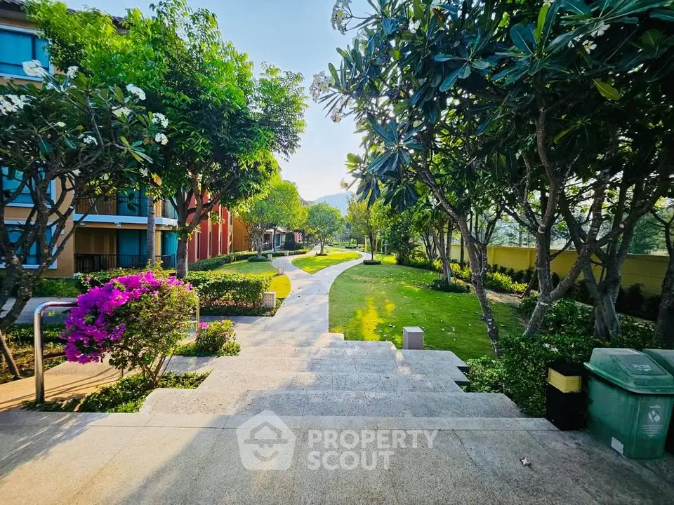 Lush garden pathway in a serene residential complex