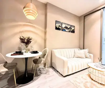 Modern living room with elegant decor and cozy seating area