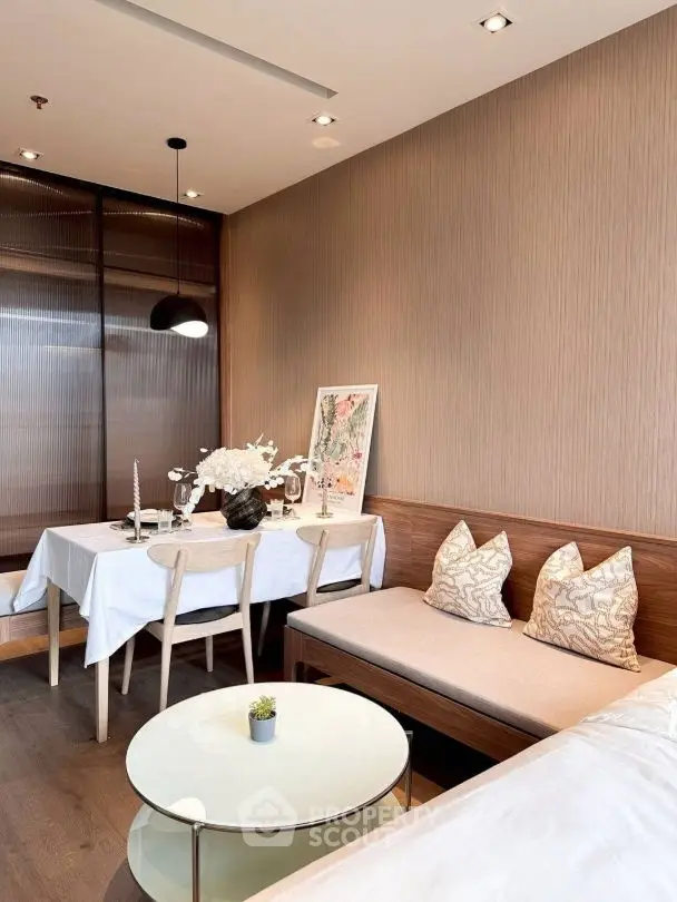 Modern living room with elegant dining area and stylish decor