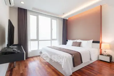 Luxurious modern bedroom with elegant decor and natural light