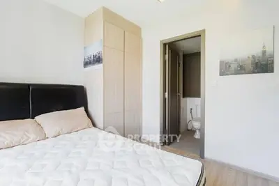 Cozy bedroom with ensuite bathroom and modern decor