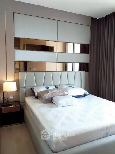 Luxurious modern bedroom with stylish headboard and elegant decor