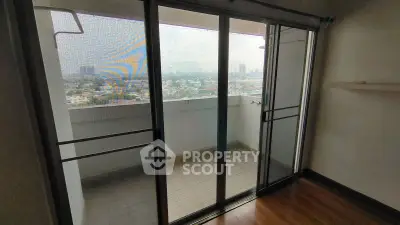 Spacious balcony with city view in modern apartment