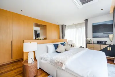 Luxurious modern bedroom with elegant decor and natural light
