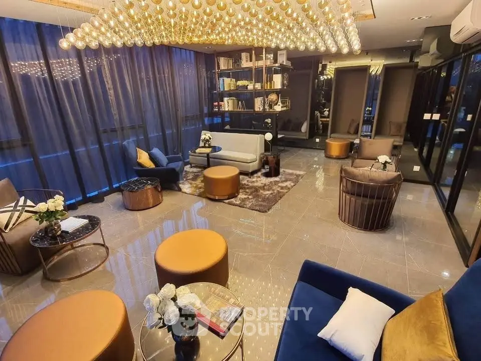 Luxurious living room with elegant lighting and modern decor, perfect for sophisticated gatherings.